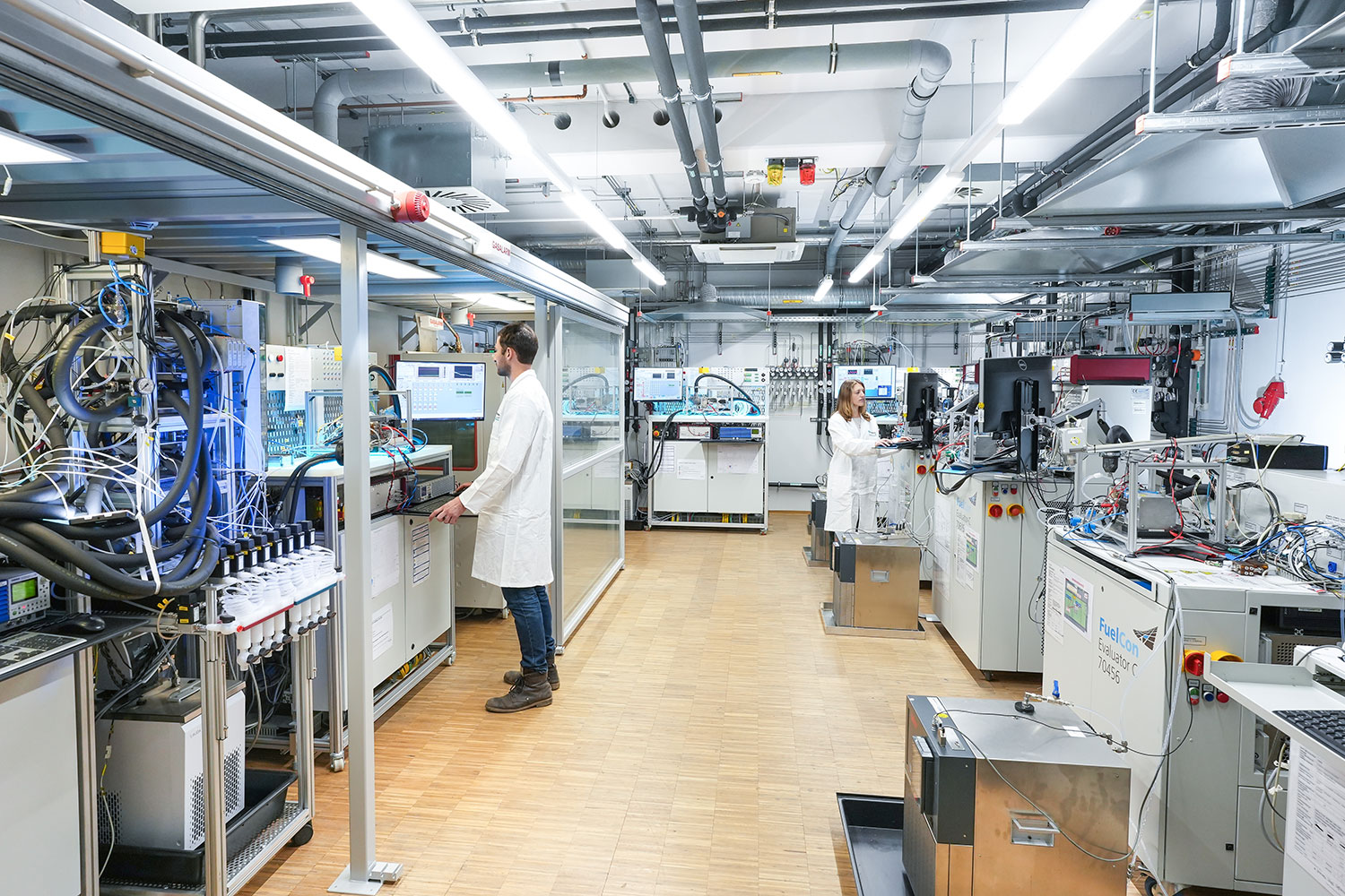 Test rigs for the electrochemical characterization of membrane electrode units for PEM fuel cells at Fraunhofer ISE.